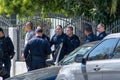 LAPD Metro Division officers and detectives huddle after Detectives serve a warran