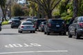 Unmarked Ford police cars parked at the scene as LAPD Valley Homicide Detectives serve a warrant.