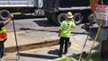 A CASE 590 Super N Backhoe Loader carefully digs around a power conduit