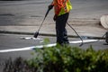 Northridge, California, United States - June 28, 2022: A contractor from Paveco Construction working for the City of Los Angeles