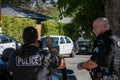 Northridge, California, United States - June 29, 2022: A multi-agency task force including LAPD Narcotics detectives stages on a