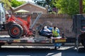 Northridge, California, USA - April 21, 2020: A City of Los Angeles Sanitation department employee places illegally dumped