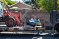 Northridge, California, USA - April 21, 2020: A City of Los Angeles Sanitation department employee places illegally dumped