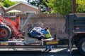 Northridge, California, USA - A City of Los Angeles Sanitation department employee places illegally dumped