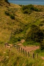 Sand dunes beside Bamburgh Castle, Nortumberland Royalty Free Stock Photo