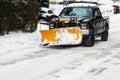 Snow plowing truck on Taylor Avenue after snow storm