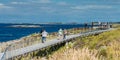 NORWAY, THE ATLANTIC ROAD - OCTOBER 2015: Tourists take pictures of each other near the Atlantic road.