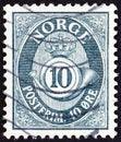 NORWAY - CIRCA 1962: A stamp printed in Norway shows crown, post horn and value, circa 1962. Royalty Free Stock Photo