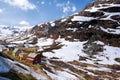 Norway with colorful wooden houses against waterfalls during spring time. Railroad from Flam to Myrdal in Norway