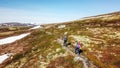 Norway - A couple hiking in the highland plateau