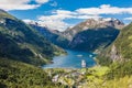 Norway cruise, mountains and village in Geiranger fjord Royalty Free Stock Photo