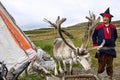 Norway: Deer and reindeer breeder dressed in national clothes