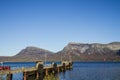 Norway fjord over the blue sea surrounded by a beautiful mountainous scenery Royalty Free Stock Photo