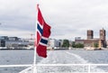 Norway flag on the ferry, view of Oslo city hall, Scandinavia Royalty Free Stock Photo