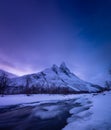 Norway. Frozen river and mountain. A classic view in Norway during winter. Royalty Free Stock Photo