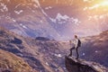 Norway hike, young woman traveler with backpack standing on the