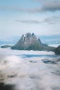 Norway landscape aerial view mountain peak above clouds Sunnmore Alps travel beautiful places Royalty Free Stock Photo