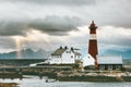 Norway Landscape Tranoy Lighthouse at sunset sea and mountains on background Travel Royalty Free Stock Photo