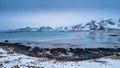 Norway Lofoten Fredvang beach  landscape in winter time and mountains covered in snow Royalty Free Stock Photo