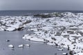 Norway and Lofoten Travel Concepts. Snowy and Stony Lofoten Islands Seascape in Norway Evenly Covered with Snow