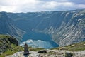 Norway. Mountain lake landscape, Odda. Ringedalsvatnet lake panorama with sunset sky, Way to Trolltunga rock Royalty Free Stock Photo