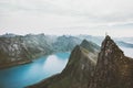 Norway mountain travel man standing on cliff edge