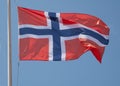 Norway the Norwegian national flag waving in the wind on a flagpole Royalty Free Stock Photo