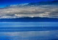 Norway ocean tidal waves with horizon mountain landscape background Royalty Free Stock Photo