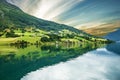 Norway, Olden, green hills seaside. Norwegian fjord in summer