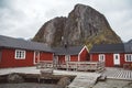 Norway rorbu houses and mountains rocks over fjord landscape scandinavian travel view Lofoten islands. Natural scandinavian