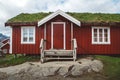 Norway rorbu houses red and with moss on the roof landscape scandinavian travel view Lofoten islands. Natural scandinavian