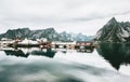 Norway village and mountains rocks over fjord