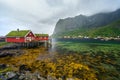 Norway village Reine near the scenic mountains and green water