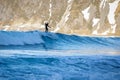 Winter surfing on the wave Norway beach, Lofoten Royalty Free Stock Photo