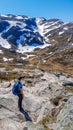 Norway - Young man enjoying the snow-capped mountains Royalty Free Stock Photo