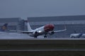 Norwegian Air Line plane taking off from Munich Airport, MUC Royalty Free Stock Photo