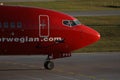 Norwegian Air Shuttle plane, close-up view Royalty Free Stock Photo