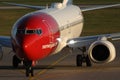 Norwegian Air Shuttle plane, close-up view Royalty Free Stock Photo