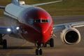 Norwegian Air Shuttle plane, close-up view Royalty Free Stock Photo