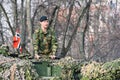 Norwegian Army armored tank with cannon and camouflage coating with soldier