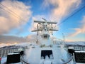 Norwegian fjord - radar, bridge of ship, mountains and dawn sky Royalty Free Stock Photo