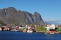 Norwegian fishing village with traditional red rorbu huts, Reine, Lofoten Islands, Norway