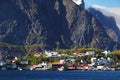 Norwegian fishing village with traditional red rorbu huts, Reine, Lofoten Islands, Norway Royalty Free Stock Photo