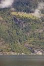 Norwegian fjord landscape with farm houses. Sorfjorden. Norway. Royalty Free Stock Photo