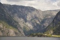 Norwegian fjord landscape with mountains and houses. Sorfjorden. Norway.