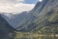 Norwegian fjord landscape with mountains and village. Sorfjorden. Norway.