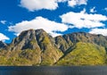 Norwegian Fjord: Mountains and sky Royalty Free Stock Photo