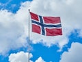 Norwegian flag waving sky Royalty Free Stock Photo