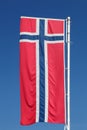 Norwegian flag waving in the sky Royalty Free Stock Photo