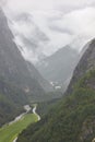 Norwegian foggy landscape with mountain and river. Stalheim view